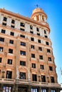 Old colorful and vintage facades in Gran Via street in Madrid