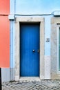Old and colorful wooden door with iron details Royalty Free Stock Photo