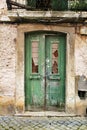 Old and colorful wooden door with iron details Royalty Free Stock Photo