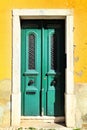 Old and colorful wooden door with iron details