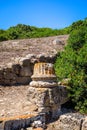 Old Column in Tharros archaeological site, Sardinia Royalty Free Stock Photo