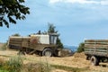 Old combine on field harvesting gold wheat Royalty Free Stock Photo