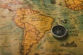 Old compass discovery on vintage paper antique world map Royalty Free Stock Photo