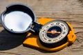 The old compass, the needle points South. Selective focus. Close up Royalty Free Stock Photo