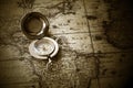 Old compass on vintage map Royalty Free Stock Photo