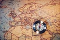 Old compass on vintage map. Adventure stories background. Retro Royalty Free Stock Photo