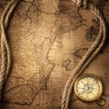 Old compass on vintage map Royalty Free Stock Photo