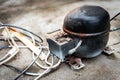 Old compressor from the refrigerator. Royalty Free Stock Photo