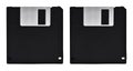 Old computer and data storage technology, two black magnetic floppy disk 3ÃÂ½ inches, isolated on white background Royalty Free Stock Photo