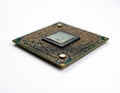 Old computer processor chip isolated on white background. Macro view of burnt electronic hardware. Digital data core damage. Royalty Free Stock Photo