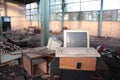 Old computer in ruined factory