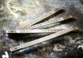 Old concertina or folding metal ruler Royalty Free Stock Photo