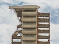 Structure of an old apartment block being demolished