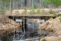 an old concrete bridge over a small river. Narrow gauge railway bridge. Royalty Free Stock Photo