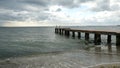 Old concrete pier-coast sea wave