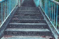 Concrete staircase with rusty blue railing Royalty Free Stock Photo