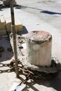 Marsaxlokk, Malta, August 2019. Bollard and anchor chains on the old pier close-up. Royalty Free Stock Photo