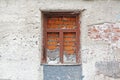 Old concrete wall with bricked up window Royalty Free Stock Photo