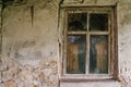 The old concrete wall with a wooden window Royalty Free Stock Photo