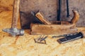 Old construction tools on a wooden workbench flat lay background. Carpenter table. Woodwork Royalty Free Stock Photo