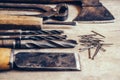 Old construction tools on a wooden workbench flat lay background. Carpenter table. Woodwork Royalty Free Stock Photo