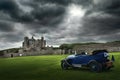 Old Convertible in front of a castle