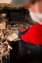 Old cooking stove, brick in soot, stove in the form of an arch, dismantling of the stove Royalty Free Stock Photo