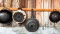 old cooking utensils hanging on the wooden wall for stay home lifestyle Royalty Free Stock Photo