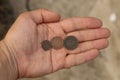 Old copper coins of India in hand Royalty Free Stock Photo