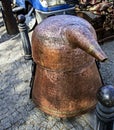 Old copper hooch is sold at the flea market in Georgia