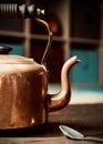 Old copper kettle on wood Royalty Free Stock Photo