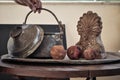 Old copper pot. cooker, bowl and pomegranate fruit Royalty Free Stock Photo