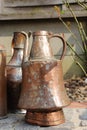 Old copper pot for water Royalty Free Stock Photo