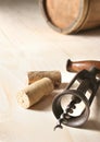 Old corkscrew and two corks Royalty Free Stock Photo