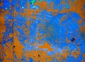 Old corroded metal wall background with flaky blue green and brown paint .Rusty flaky cracked metal surface.Abstract the surface t Royalty Free Stock Photo