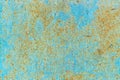 Old corroded metal wall background with flaky blue green paint .Rusty flaky cracked metal surface.Abstract the surface texture of Royalty Free Stock Photo