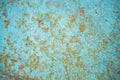 Old corroded metal wall background with flaky blue paint .Rusty flaky cracked metal surface.Abstract the surface texture of the o Royalty Free Stock Photo