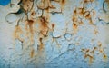 Old corroded metal wall background with flaky blue paint .Rusty flaky cracked metal surface.Abstract the surface texture of the o Royalty Free Stock Photo