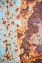 Old corroded metal wall background with flaky blue paint .Rusty flaky cracked metal surface.Abstract the surface texture of the o Royalty Free Stock Photo