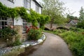 A path between Old cottages, timber frame houses in contryside Royalty Free Stock Photo