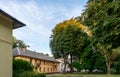 Old cottage in cozy town. Street view landscape old cirty, little houses on sunset. Old architecture front view Royalty Free Stock Photo