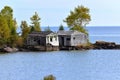 Old cottage on the lake superior shoreline Royalty Free Stock Photo