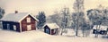 Old cottages, houses in a snowy winter landscape Royalty Free Stock Photo