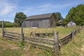 Old country barn and fence Oregon. Royalty Free Stock Photo