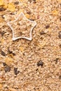 Old country style muesli background, star-shaped bowl.