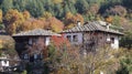 Old countryside houses at a small village surrounded by trees on a sunny day Royalty Free Stock Photo