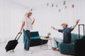 Old Couple with Bags in Airport in Waiting Room.