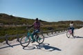 Old couple with bikes at the beach Royalty Free Stock Photo