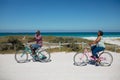Old couple with bikes at the beach Royalty Free Stock Photo