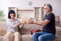 Old couple doing the online shopping Royalty Free Stock Photo